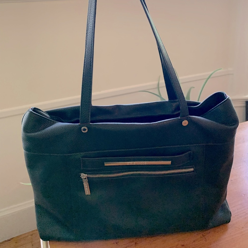 Steve Madden red lined tote with removable laptop sleeve.